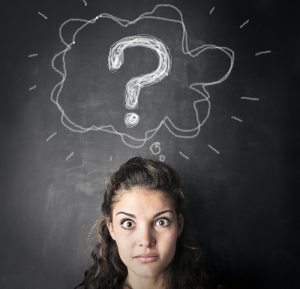 question mark above woman's head