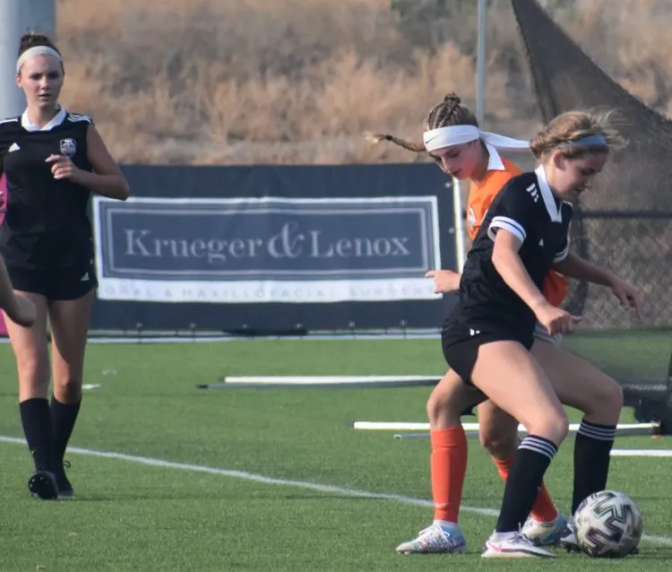 Girls playing soccer
